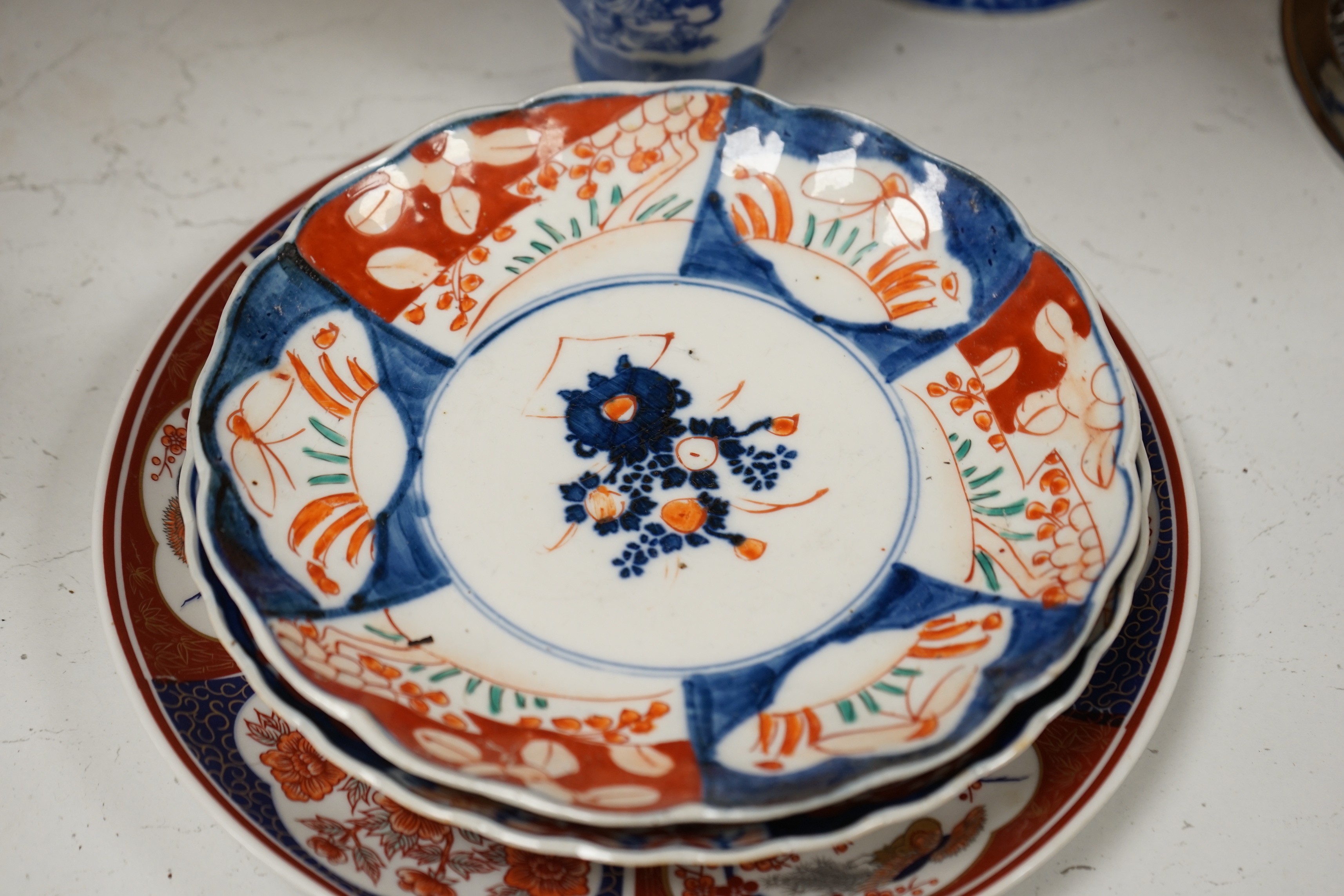 A group of Japanese ceramics to include Imari dishes a Seto ware blue and white vase etc. tallest 30cm